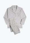 A grey and white gingham pajama set with long sleeves and button-fly pants.